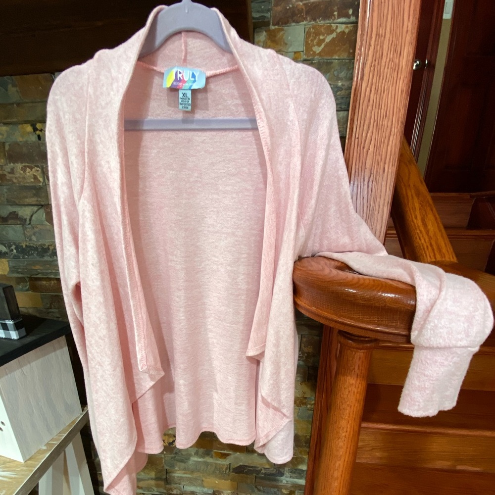 Girls light pink size XL cardigan. Great condition!